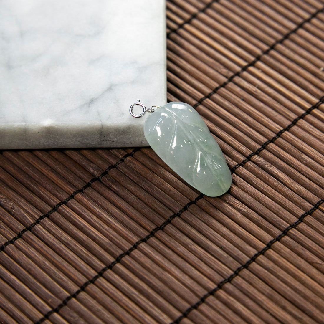 18K Platinum Natural Burmese Jade Light Green Piao Hua Leaf Pendant