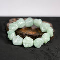 Natural Burmese Pale-Green Carved Laughing Buddha Face Bead Bracelet