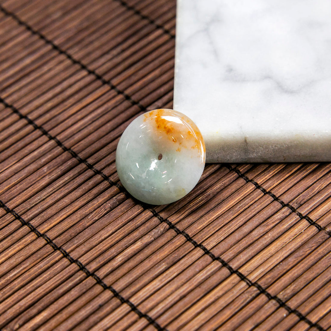 Natural Burmese Jade Icy Light Green Ping An Donut with Shades of Orange